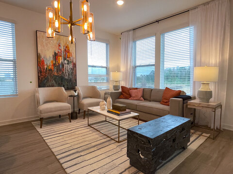 A Living Room Area With Midcentury Moden Furniture In A Condominium Model Home In Orlando, Florida.