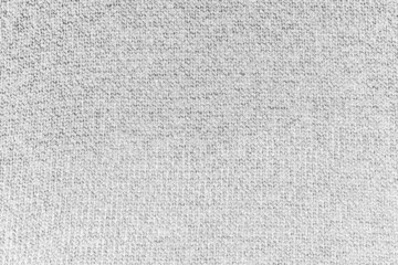 Fototapeta na wymiar Light gray knitted wool fabric texture background