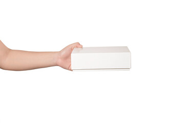 Hand holding a white cardboard box