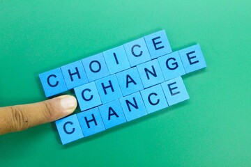 blue squares with the words choice chance Change. the concept of election. select Change