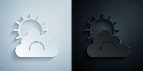 Paper cut Sun and cloud weather icon isolated on grey and black background. Paper art style. Vector