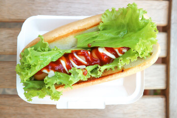 hot dog, pork sausage or sausage roll or breaded sausage with vegetable