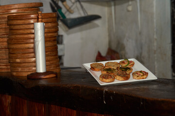 Appetizers placed on a counter in a restaurant