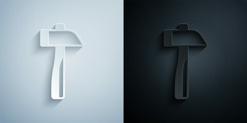 Paper cut Hammer icon isolated on grey and black background. Tool for repair. Paper art style. Vector