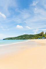 Obraz na płótnie Canvas Landscape sea white clouds soft daylight. Blue sky tourists relax famous beach island. 