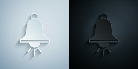 Paper cut Ringing alarm bell icon isolated on grey and black background. Fire alarm system. Service bell, handbell sign, notification symbol. Paper art style. Vector