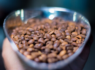 Coffee beans on a steel plate