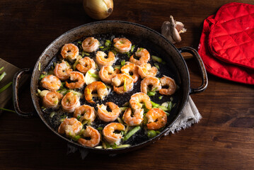 Peeled shrimp pan fried with green onions and garlic
