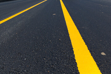 Asphalt road as abstract background