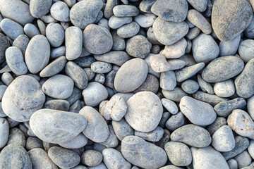 Wet sea pebbles. Pebbles on the sea