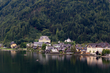 Fototapeta na wymiar beautiful landscapes with mountains and clouds , pictures of Hallstatt city in Austria 