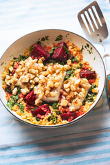 Cod fish with breadcrumbs, beetroot, spinach and lentils