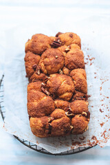 Monkey yeast bread with cinnamon and pecans, vanilla icing