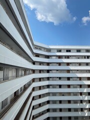 The white building contrasts with the blue sky. that reflects the crowded and simple lifestyle of the people of Chiang Mai