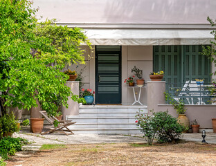 Fototapeta na wymiar contemporary house facade and garden, Athens, Greece