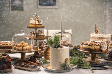 Fancy sweets table with variety of Christmas desserts,
