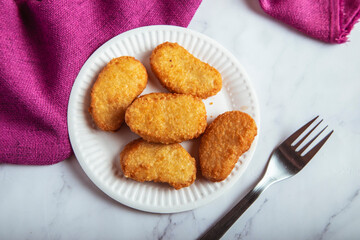 Breaded homemade chicken nuggets, top view