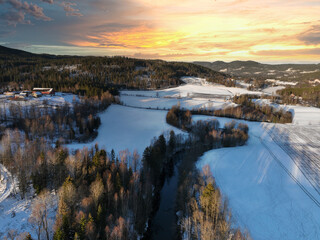 Sunrise over Oslo, Norway. Shot just outside of the city a winter morning in December. Shot high up in the sky with a drone. DJI Mavic 3