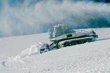 Snowcat, machine for snow removal, preparation ski trails, snow groomer