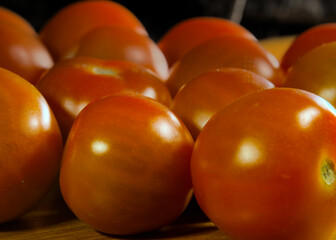 Tomatoes on a wooden surface 