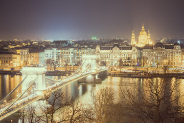 BUDAPEST, HUNGARY - DECEMBER 18, 2017: The Szechenyi Chain Bridge is a suspension bridge that spans...
