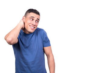 Man looking to the side with an expression of shyness