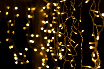 Blurry lights garland of gold color