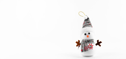 Snowman in the snow. New Year Merry Christmas. Red hat. On white background. Lots of snowmen. Christmas decorations. Santa.	