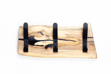 Wooden hanger. Metal black hook On a white background.