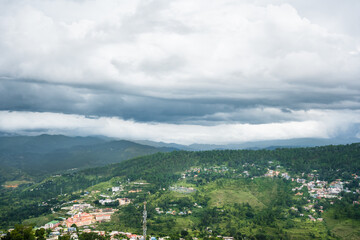 Fototapeta na wymiar Landscape with mountains and clouds in Almora, Uttarakhand, India