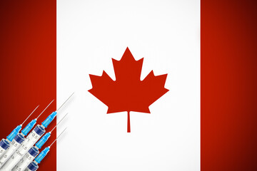 Canadian flag with several syringes in left corner. Symbol of universal vaccination against covid in Canada.