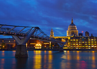 Fototapeta na wymiar Millennium Bridge and St Pauls Cathedral at Dusk, London, United Kingdom