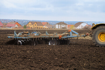 Cultivation of the soil with a disc harrow