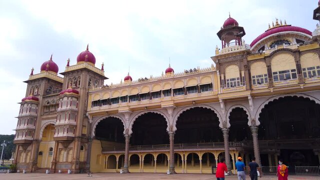 MYSORE, INDIA - Nov 24, 2020: The Mysore Palace surrounded by a garden in Mysore, India shot in 4K