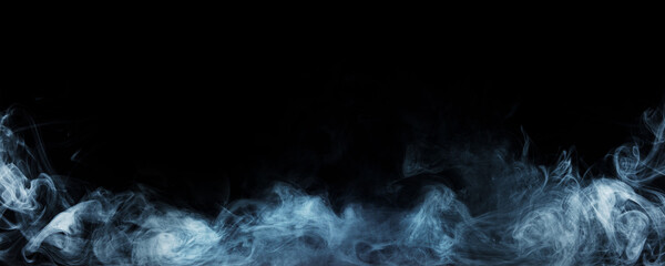 Panoramic view of the abstract fog. White cloudiness, mist or smog moves on black background. Beautiful swirling gray smoke. Mockup for your logo. Wide angle horizontal wallpaper or web banner.