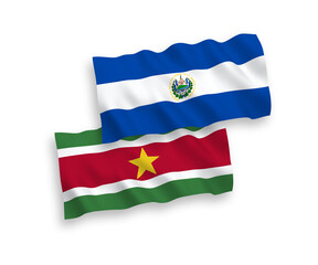 Flags of Republic of El Salvador and Republic of Suriname on a white background