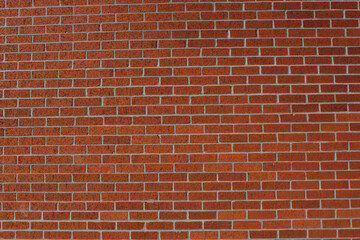 Fototapeta na wymiar Close-up Building Detail Historical Brick Wall With Doors and Windows