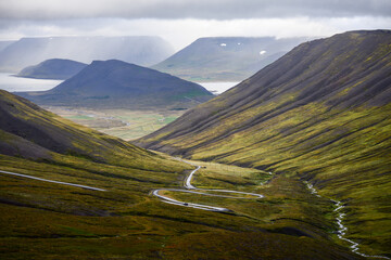 A winding mountain road through the Westfjords region of Iceland, between Dyrafjördur and Arnarfjördur.