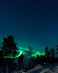 Obraz na płótnie Canvas Aurora Borealis, or Northern Lights at Lake Inari, Finnish Lapland