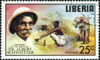 LIBERIA - 1975: shows Lioness, woman cooking outdoors, series Dr. Albert Schweitzer (1875-1965),...