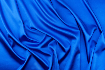 Blue satin or silk fabric as background