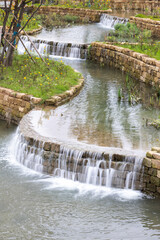 Naklejka premium The stream trickled down from a high place