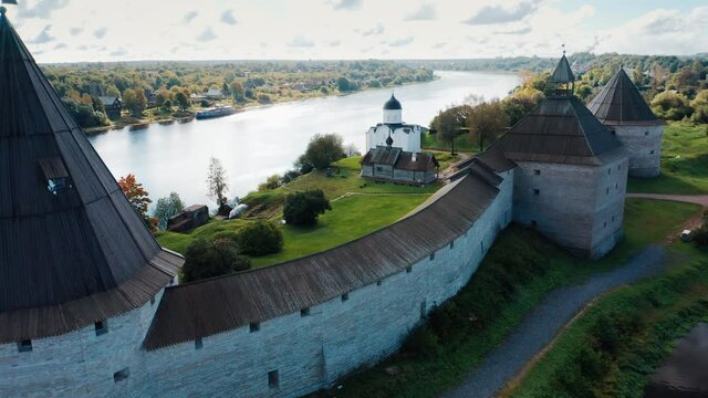 Old Russian fortress. Ancient fortress on the coast of Volkhov river in the town of Staraya Ladoga (Old Ladoga) in Russia. Aerial view of the ancient fortress.