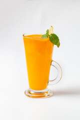 Winter hot vitamin drink with orange, ginger and mint on white background