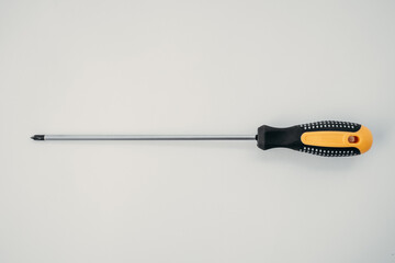 Phillips screwdriver with long tip on white isolated background