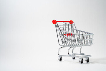 Customer trolley for a store on a white background, place for text, advertising