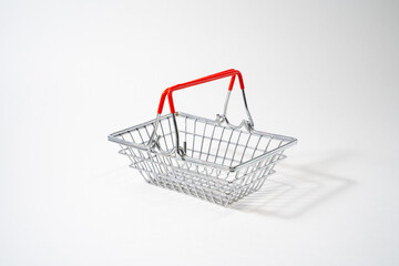 Basket with raised handles on white isolated background