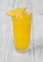 Glass of Mango Punch cocktail