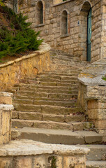 ancient stone stairs near the stone wall