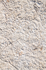 Natural natural stone with texture. Cracks and lines